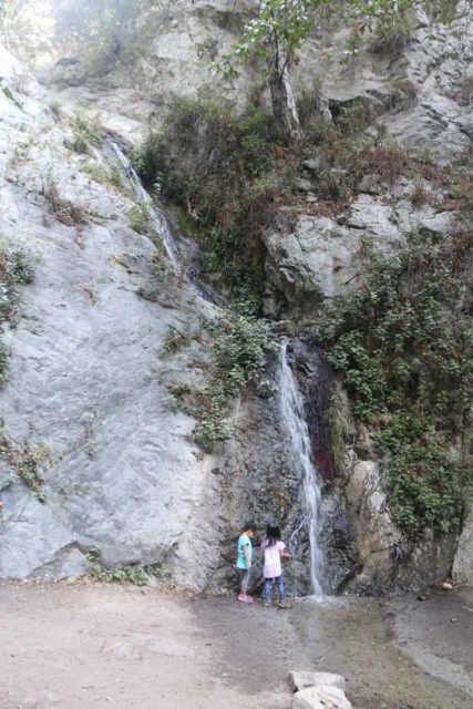 Monrovia_Canyon_Falls_052_11132016 - Tahia sharing her Monrovia Canyon Falls experience with a stranger during a visit in November 2016, which attested to this waterfall's resiliency