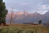 Mormon_Row_043_08132017 - More contextual look to the left of the Tetons where other barns and mountains were getting the morning sun