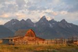 Mormon_Row_062_08132017 - The best light on the Moulton Barn was starting to fade while the Grand Tetons remained under the cloud shadows