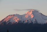 Mt_Shasta_323_06192016 - As the last of the sun's light was turning the snowfield atop Mt Shasta orangish, a lenticular cloud was streaking from its summit