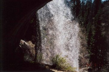 Nobe Young Falls was once the secret treasure of the Sequoia National Forest. Now that the secret is out, it's no longer surprising to find company both behind and below the waterfall...