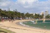 Noumea_151_11282015 - Context of the festive scene along Anse Vata with windsurfers nearing the beach shores