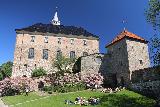Oslo_074_06172019 - Another look across a lawn towards a side of the Akershus Festning in Oslo