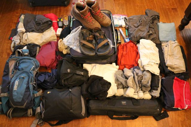 This is the context of my belongings before I stuff them into a carry-on luggage as well as the day pack acting as a carry-on item back during the 2015 time frame