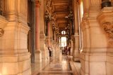Paris_18_846_07262018 - Walking along the balcony flanked by columns at the Palais Garnier or L'Opera in Paris