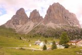 Passo_Sella_024_07172018 - Last look at the Sasso Lungo Group and the hamlet of Passo Sella from one of the rare roadside pullouts in the Dolomites of Northern Italy