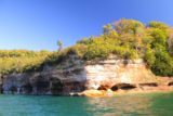 Pictured_Rocks_cruise_204_09302015 - Checking out a series of little alcoves cutting into the bases of the cliffs of the Pictured Rocks, which kind of hint at some of the erosion action while yielding tiny natural arches in them