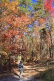 Piney_Waterfalls_003_20121024 - Julie hiking amidst some gorgeous Fall colors at the start of the trail to the Piney Waterfalls