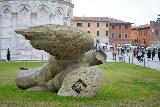 Pisa_050_11192023 - Checking out the fallen angel statue near the Leaning Tower of Pisa