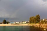 Port_Campbell_077_11162017 - A rainbow arcing over Port Campbell just as a thunderstorm was rapidly approaching the jetty