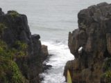Punakaiki_012_jx_12282009 - A tiny sea arch and channel near the Pancake Rocks