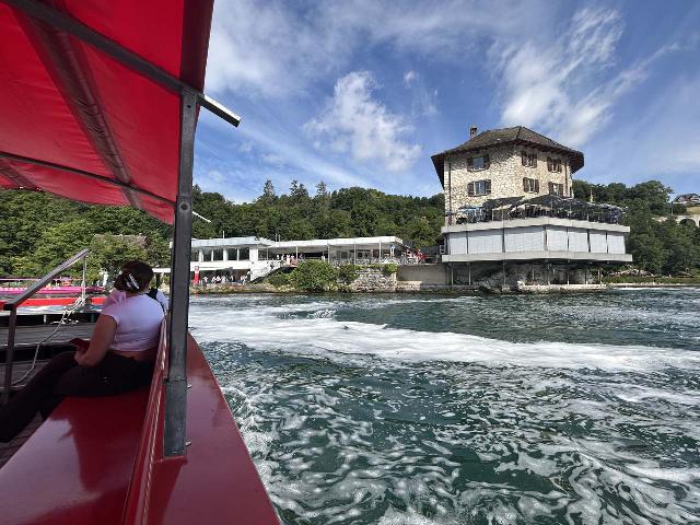 Rhine_Falls_129_iPhone_14_06272025 - Since I started on the Schloss Laufen side, I first had to do the Rhine Crossing on this red boat to get to the Schlossli Worth side before going on the yellow boat for the Rock Tour