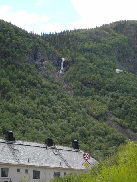 Rjukan_002_jx_06222005 - Looking over one of the power station buildings near Vemork towards one of the waterfalls tumbling towards the town of Rjukan