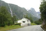 Romsdalen_246_07162019 - Context of Ølmåfossen as I continued to drive past some houses as I was northbound on the E136