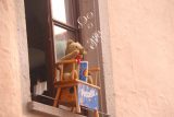 Rothenburg_376_07232018 - A doll that was set up to blow bubbles out onto the street by the Hauptmarkt in Rothenburg ob Der Tauber