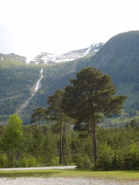 Rv_9_001_jx_06222005 - Julie pointed her camera to the opposite side of Setesdal Valley from Kallefossen as she saw this tall waterfall though I wasn't sure which waterfall it was