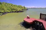 Saleaula_Lava_Fields_047_11152019 - Julie briefly chilling out at the viewing platform jutting out onto the lagoon at the Saleaula Lava Fields in Savai'i
