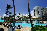 San_Juan_014_04142022 - Looking back across a large swimming pool area at the Caribe Hotel in San Juan