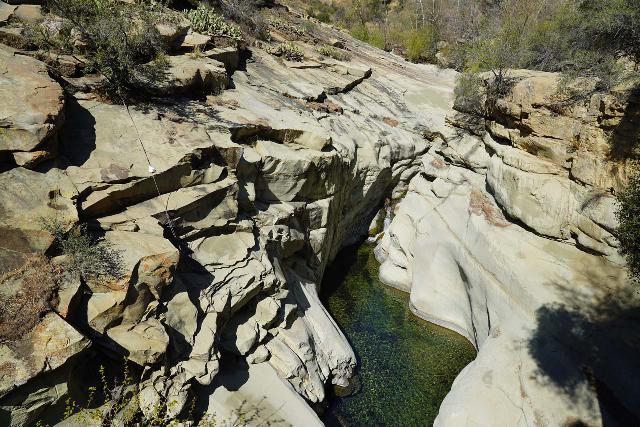 Santa_Paula_Canyon_269_03052021 - Looking down at the context of the 'Upper Punch Bowls' from the Last Chance Trail. If you look closely, you might notice a rope dangling on the steep cliff facilitating access to that pool for those with a propensity for risk