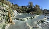 Saturnia_026_iPhone_11182023 - Broad pano look at the right side of the Cascate del Mulino revealing the context of the nice travertine pools and cascades