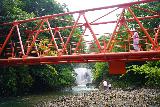 Sekiyama_063_07202023 - Looking under a red bridge towards the front of the Sekiyama Waterfall