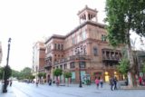 Sevilla_020_05242015 - Looking back at a decorative building along the Avenida de la Constitucion