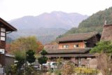 Shirakawa_058_10202016 - Looking past some of Ogimachi's buildings towards some mountains in the distance