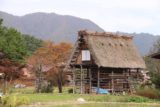 Shirakawa_102_10202016 - Looking towards a stilted thatched-roof home in Ogimachi