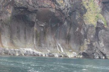 The Furepe Waterfall is kind of a percolating spring waterfall that seeps out of the sea cliffs and right into the Sea of Okhotsk.  Like Kamuiwakka-no-taki, I've included a separate page...