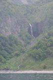Shiretoko_tour_256_06072009 - Another one of the many waterfalls seen off the coast of the Shiretoko Peninsula