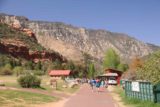 Slide_Rock_SP_005_04132017 - The wide open and paved walkway flanked by historic cabins, restrooms with change rooms, and shops, leading to Slide Rock