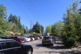 Snoqualmie_Falls_17_002_07292017 - The busy parking lot at Snoqualmie Falls where several people were circling around looking for a rare parking spot while tensions were high