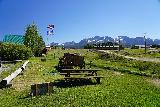 Stanley_017_06162021 - Another contextual look towards the Sawtooth Mountains over some wagon and picnic table by our accommodation in Stanley, Idaho