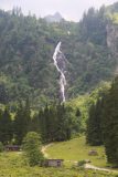 Steirischer_Bodensee_149_07032018 - Looking back at the Steirischer Bodensee Waterfall with some size context thanks to the buildings and some hikers on the trail