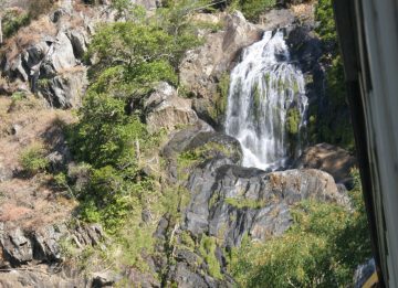 Stoney Creek Falls was a waterfall that we were under the impression was only viewable while riding the Kuranda Scenic Railway.  Based on this assumption, that was the primary reason why Julie and...