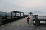 Sun_Moon_Lake_189_11012016 - Mom walking towards the pier with a view towards the fog over Sun Moon Lake