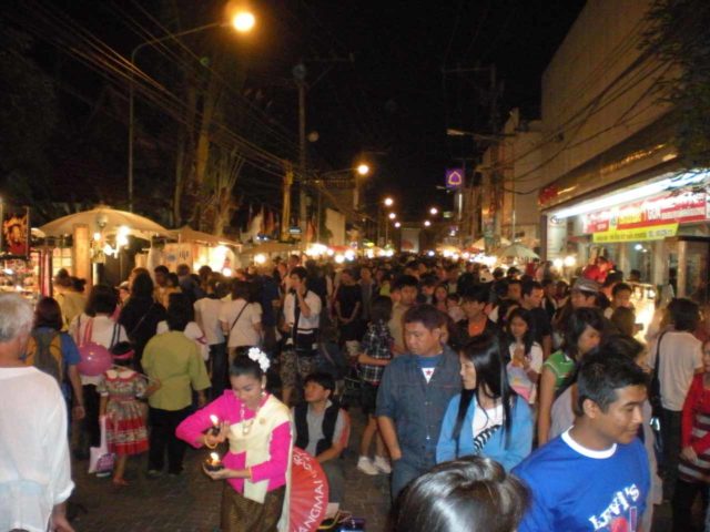 The city of Chiang Mai in Thailand is a place where we feel confident enough to self-book our own accommodations with Booking.com, but we'd consider hiring help to tour the rest of the country. Shown here is Chiang Mai's atmospheric Sunday Walking Street