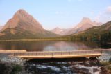 Swiftcurrent_Falls_002_08072017 - Looking back over the bridge spanning Swiftcurrent Creek (at the mouth of Swiftcurrent Lake) right at the brink of Swiftcurrent Falls