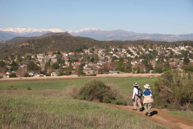 Sycamore_Canyon_Falls_050_01242010 - Mom and Julie approaching Potrero Road and residences as we were about to conclude our January 2010 hike where we took the Wendy Trail approach