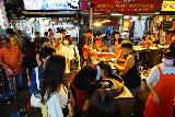 Taipei_053_06272023 - People lining up to buy some of the hujiaobing served up at the front stall of the Raohe Night Market