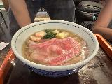 Takayama_008_jx_04132023.JPEG - Checking out a Hida Steak cooking in the hot soba broth served up at Kofune in Takayama