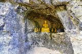 Talofofo_Falls_019_11192022 - A Buddhist shrine inside a cave alcove adjacent to the suspension bridge fronting the Talofofo Falls 1