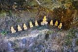 Talofofo_Falls_032_11192022 - Another series of Buddha figurines next to the suspension bridge before Falls 1 of Talofofo Falls