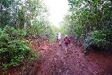 Tarzan_Falls_019_11202022 - Chris leading Julie and Tahia past a muddy part of the 4wd track to the Tarzan Falls