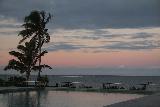 Taumeasina_Island_048_11162019 - Looking towards purple twilight skies from the dining area of the Taumeasina Island Resort