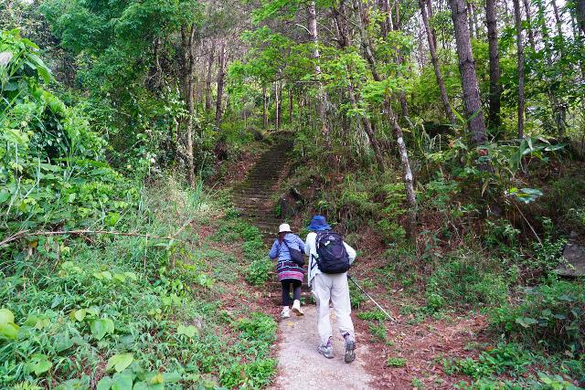 Thac_Tinh_010_04142025 - Our Sapa guide and Mom going up many steps on the way to the Thac Tac Tinh Waterfall