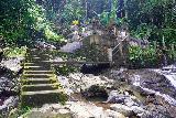 Tibumana_079_06172022 - Looking back at the outdoor shrine skirting alongside the cascade downstream of the Tibumana Waterfall