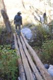 Trail_Canyon_Falls_019_01192013 - Julie crossing a makeshift log bridge