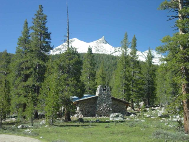 Tuolumne_Meadows_042_05312004 - Early in our hike to Waterwheel Falls on our first attempt, we passed through Tuolumne Meadows which was surrounded by granite formations like Unicorn Peak behind this cabin