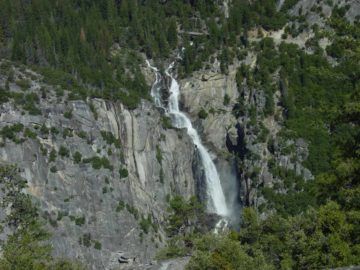 Clearly the main waterfall attraction in this section of Yosemite, Cascade Falls tumbles several hundred feet before being joined by Tamarack Creek and forcefully plunging the final 500ft...